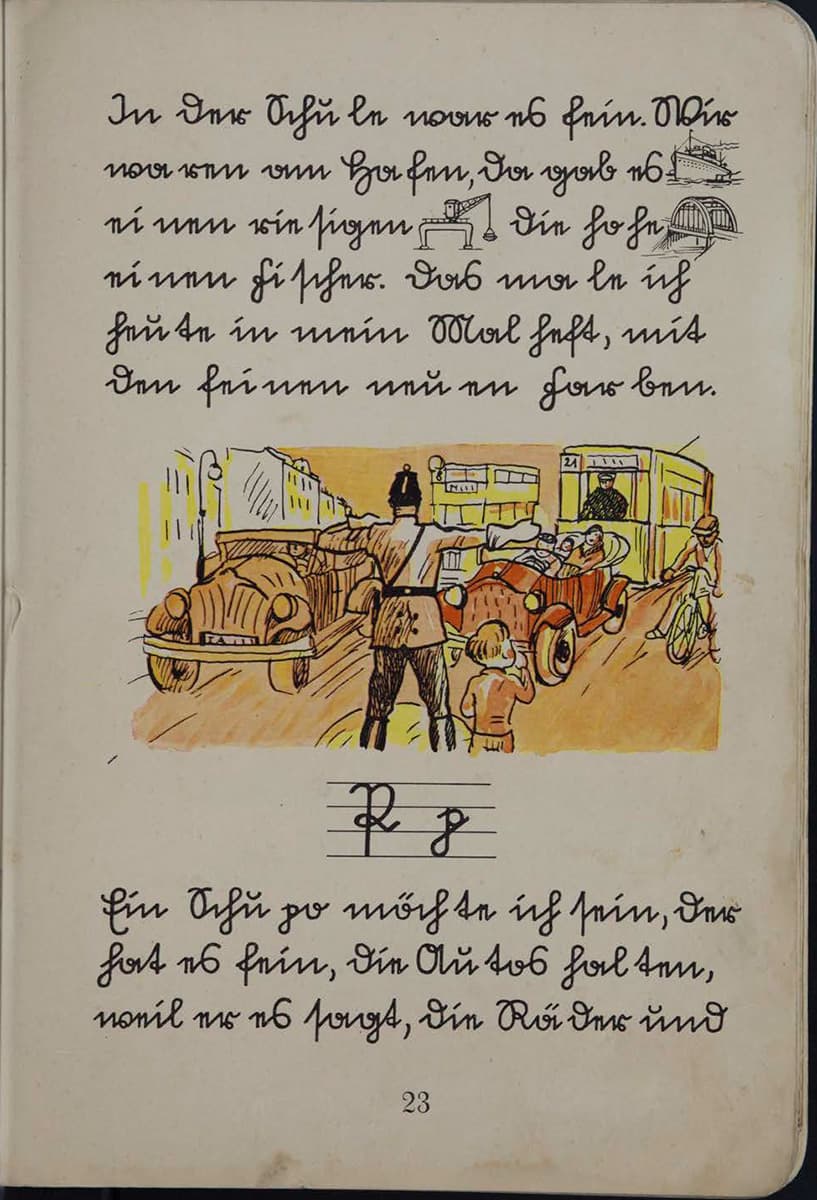 In the middle of the page is an illustration showing a man in uniform standing with his back to us, preventing cars, trains, and bicycles from crossing the street. A child is standing next to him. The text is written in cursive and serves as an exercise and to help understand cursive writing.