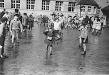 First day of school, view of a school courtyard with children playing